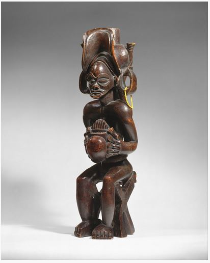 statue-de-chef-(mwanangana)-jouant-de-la-sanza-h-42,5cm-avant-1869-MET.JPG